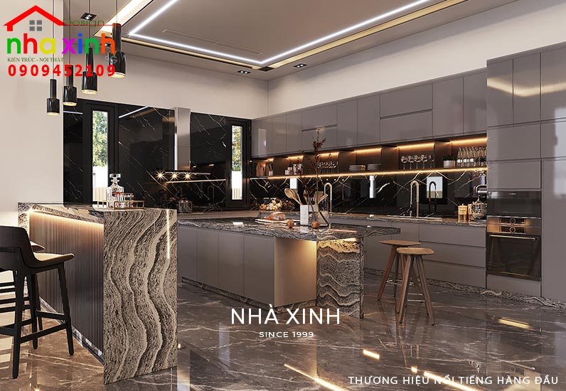 Khu vực bếp được thiết kế độc đáo với bàn đảo, quầy bar mini