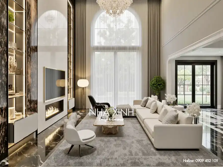 Phòng khách biệt thự BT-0223 tone màu trầm với sofa da cao cấp và đèn chùm pha lê
