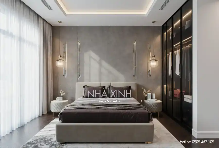 Phòng ngủ phụ biệt thự BT-0230 với cửa sổ kính lớn nhìn ra không gian xanh.